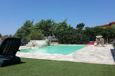 Image de Bel appartement pour 4 personnes avec piscine, Wifi, Tv, patio et parking, près de Castelsardo