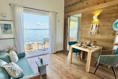 Enjoy your own bungalow over the water in our Coral Bay boutique bungalow resort