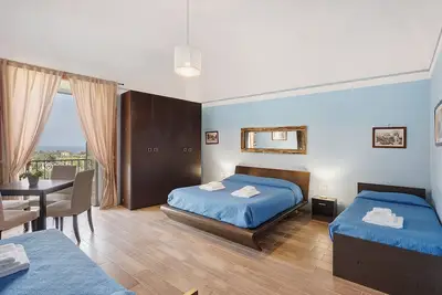 Chambre 'Maruzzella' avec terrasse partagée, Wi-Fi et climatisation