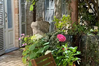 Image de House with a garden, downtown, 7 km from the beaches.