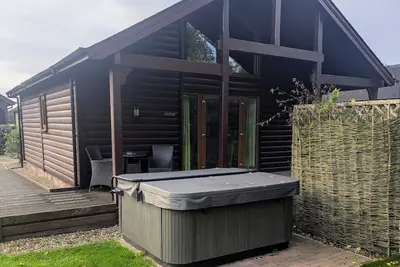 Image de de Luxe-Lodge-Salle de bain privée séparée-Vue sur Lac-Hot Tub