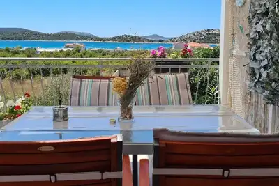 Image de Appartement d'une chambre avec la terrasse et la vue sur le mer Tribunj, Vodice (A-23680-b)