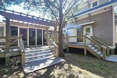 Image de The Cozy Cottage l Screened Porches l Outdoor Showers
