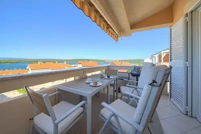 Image de Appartement de vacances avec climatisation et vue sur la mer