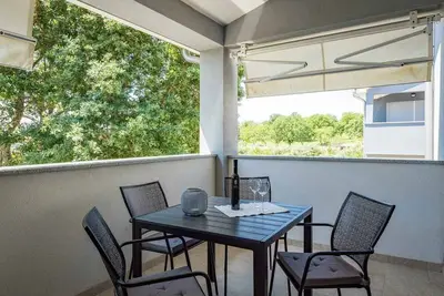 Appartement de vacances avec climatisation et balcon