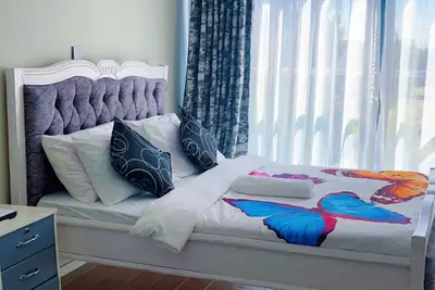 Image de Cozy studio in fantastic Nairobi with Ac, WiFi, Security, fridge, microwave, malls