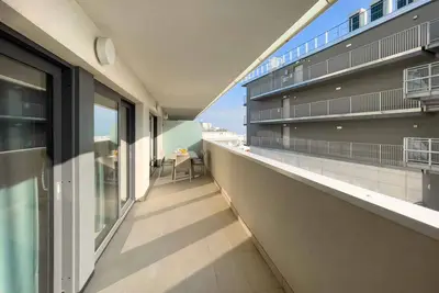 Image de Appartement de vacances avec climatisation et balcon avec vue sur la lagune