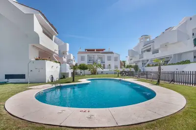 Image de Appartement 'Con Piscina En Playa Islantilla' avec vue sur la mer, piscine partagée et Wi-Fi