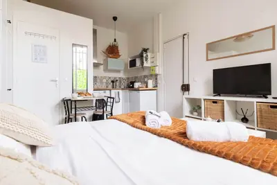 Image de Appartement cosy proche de Paris - Wifi - Free Parking - Tv