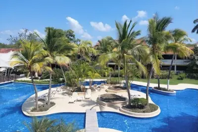 Image de ✨️Enjoy 1 bedroom suite with amazing swimming pool, private beach&golf course⛳️\n