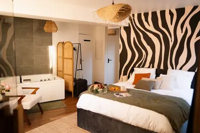 Image de Suite Cara - Logement Atypique - Sauna & Balnéo