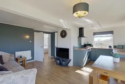 Image de Located in a quiet spot in the dunes, offering a peaceful, rejuvenating retreat.