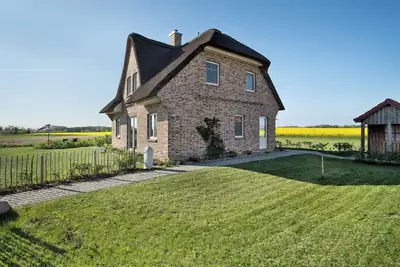 Image de Maison de vacances 'Meerzeit' avec vue sur lac, terrasse privée et Wi-Fi
