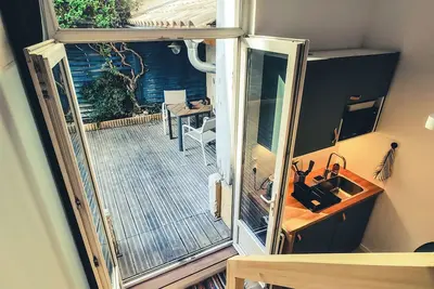 Image de Le nid. Studio cozy avec Clim et Patio, Central, à 2 pas de la gare, très calme.