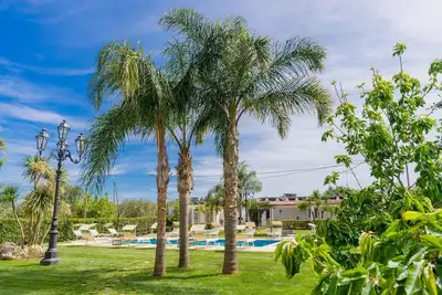 Image de Bel appartement dans une maison de vacances avec climatisation, piscine, Wifi, Tv, véranda