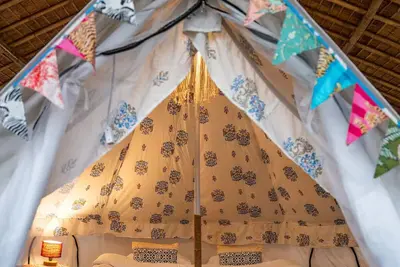 Glamping Bell Tent over a Bamboo Machaan
