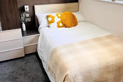 Image de Cozy 6-Bedroom House with Ample Free Parking