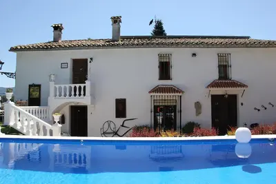 House with pool, garden, incredible views and well located.