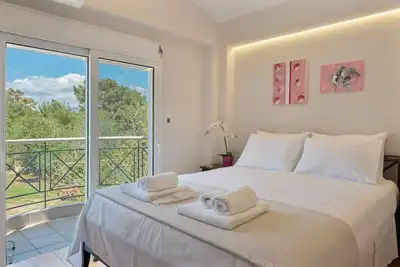 Image de Chambre 'Chambre 4 à l'étage' avec terrasse partagée, Wi-Fi et climatisation