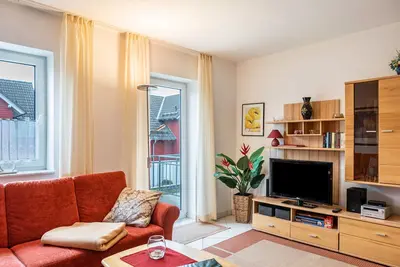 Image de Appartement 'Ferienwohnung Tannenblick 3-2-3-3' avec vue sur la montagne, jardin partagé et Wi-Fi