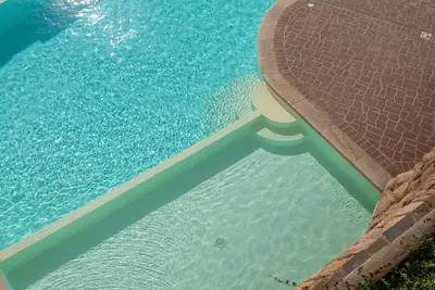 Image de Joli appartement avec piscine, climatisation, Tv et parking, près de Porto Cervo