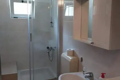 Image de Apartmani Podgora 1, 2+2