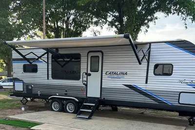 Image de Cozy campground with WiFi and Ac. Walk to the Charlotte motor speedway.
