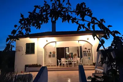 Image de Appartement 'Carloforte' avec vue sur la mer, terrasse privée et jardin privé