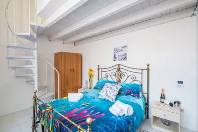 Maison de vacances 'Rhapsody By The Sea' avec vue sur la mer, jardin privé et climatisation