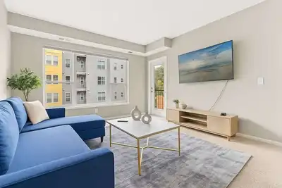 Image de Cozy 2br | King + 2 Queens + Walk to Xcel Arena