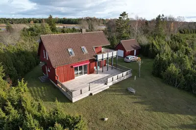 Image de Vacation home with views and access to the Baltic Sea and bathing lake at the rear