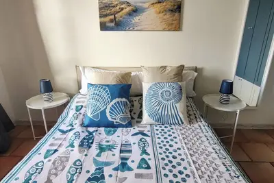 Image de Your corner of relaxation just steps from the beaches with Wi-Fi and A\/C