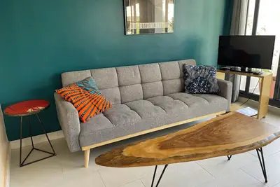 Image de Saly Sanctuary: Modern 1-bedroom apartment with WiFi, Ac, 200m to beach