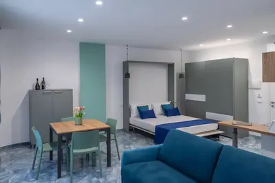 Image de Appartement 'Monolocale A Due Passi Dagli Scavi' avec vue sur montagne, Wi-Fi et climatisation