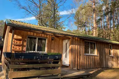 Image de Bungalow '-Waldgrün-' avec terrasse privée, jardin partagé et Wi-Fi