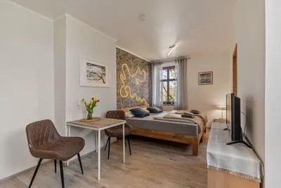 Image de Appartement 'Kleine Mit Garten' avec terrasse partagée, jardin partagé et Wi-Fi