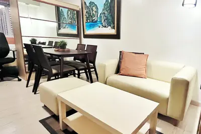 Image de Cozy 1-Br condo in Bgc with WiFi and Parking!