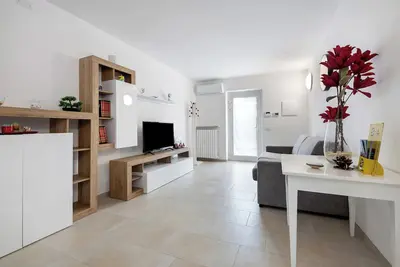 Image de Appartement 'La Villa Del Caribe Bilocale' avec vue sur le lac, Wi-Fi et climatisation