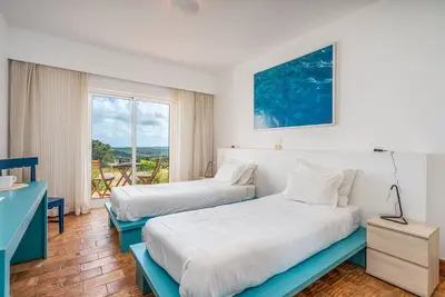 Image de Chambre 'Janeiro' avec vue sur la mer, piscine partagée et Wi-Fi