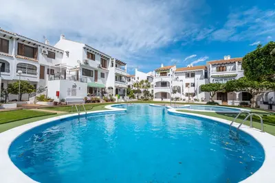 Image de Appartement 'Rincón Playa Flamenca' avec vue sur la mer, piscine partagée et Wi-Fi