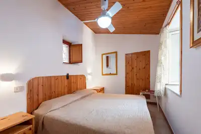 Image de Appartement 'La Casetta Della Rocca' avec vue sur les montagnes, Wi-Fi et climatisation