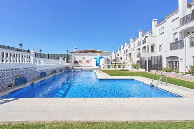 Image de Appartement 'Casa Rosi Nerja' avec piscine partagée, Wi-Fi et climatisation