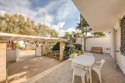 Image de Maison de vacances 'Luce Sulla Spiaggia' avec jardin privé et climatisation