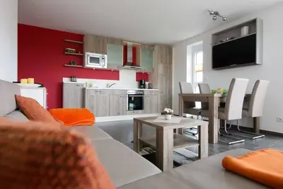 Image de \"De Kohbloom\" - Relax on the North Sea in cozy dike proximity with balcony!
