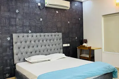 Image de Discover a 3-bedroom villa nestled in the vibrant heart of Thiruvananthapuram.