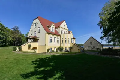Image de Gutshaus Grubnow Ferienwohnung 2 am Wasser Sauna und Wlan incl.