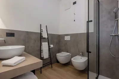 Image de Triple room consisting of double bed and single sofa bed
