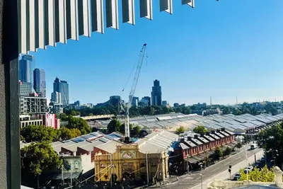 Central Melbourne Getaway with City View Balcony; near Tram Stop & Train Station