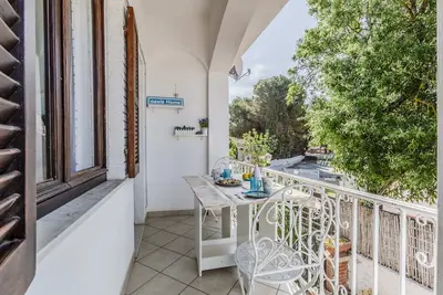 Image de Oasis home, just steps from Porto Pino long beach