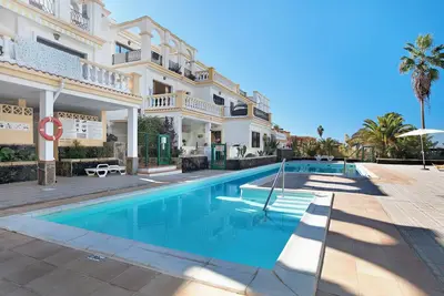 Image de Vacances 'Sueños del Sur' avec vue sur mer, piscine partagée et terrasse privée